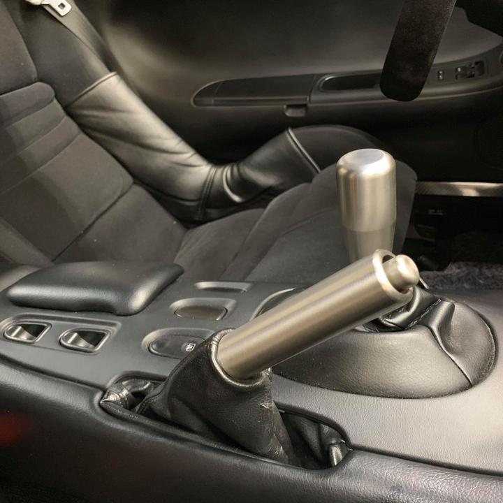 FD3S_Titanium_Parking_Brake_and_Shift_Knob_720x.jpg