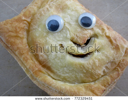 stock-photo-funny-face-pie-with-googly-eyes-a-pie-to-make-you-smile-772329451.jpg